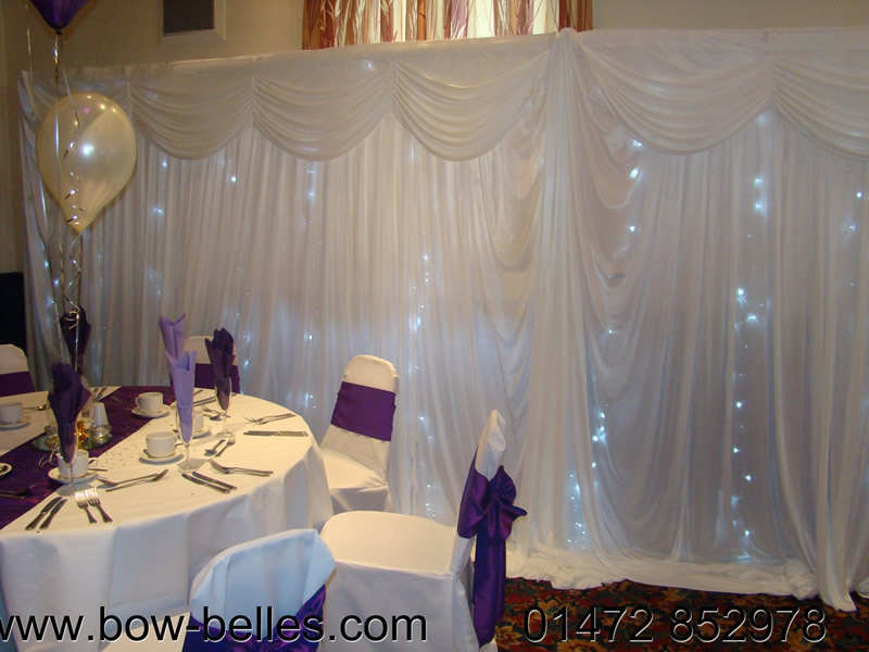 Our display of our Chair Covers, Sashes, Ostrich Feather Centre Pieces, Runners and our New Light Curtain. Venue Decoration discounts will be available on the day and for anyone who books with us before the end of May.